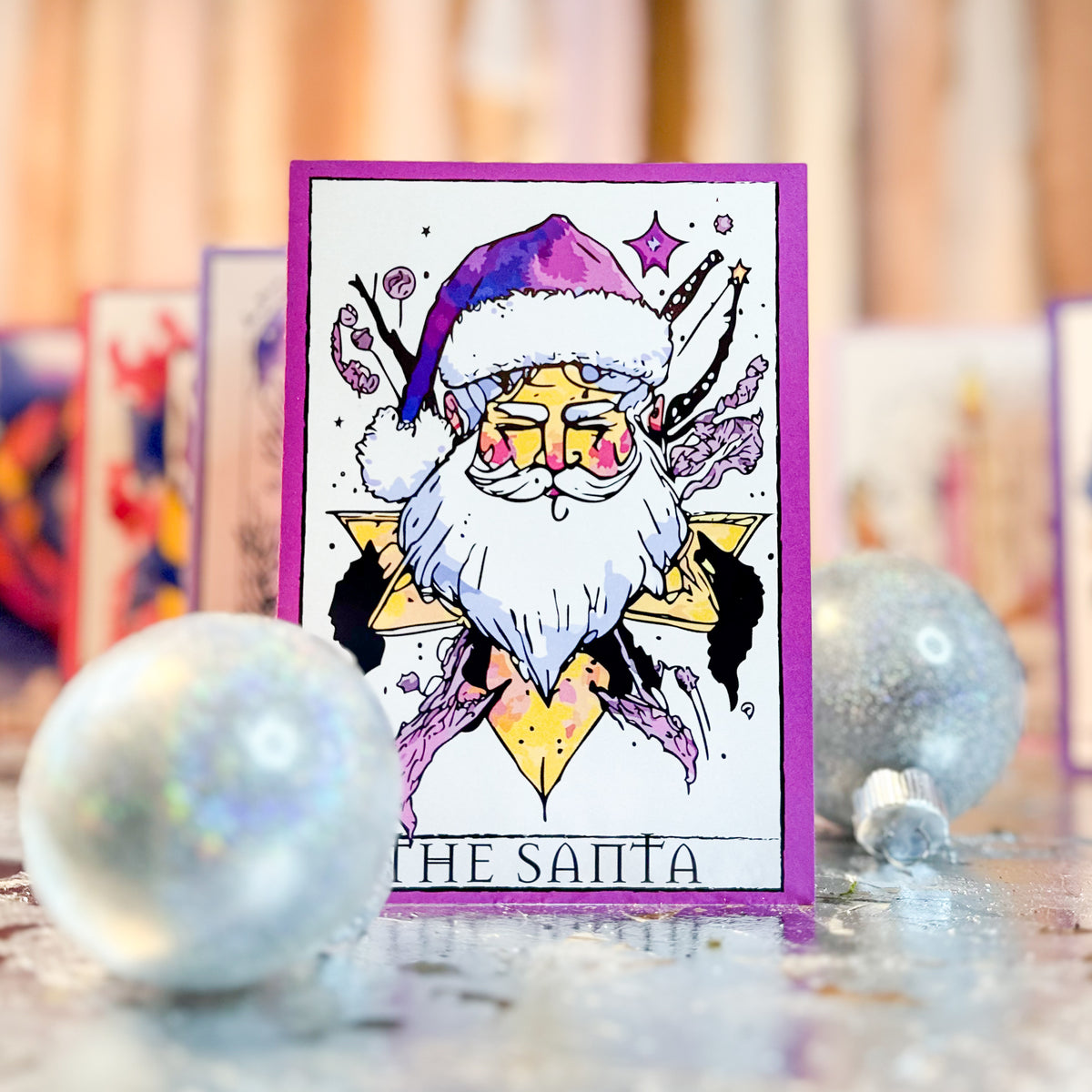 Christmas card set featuring 24 subjects including Santa, a snowman, a gnome, a wreath, and an angel.
