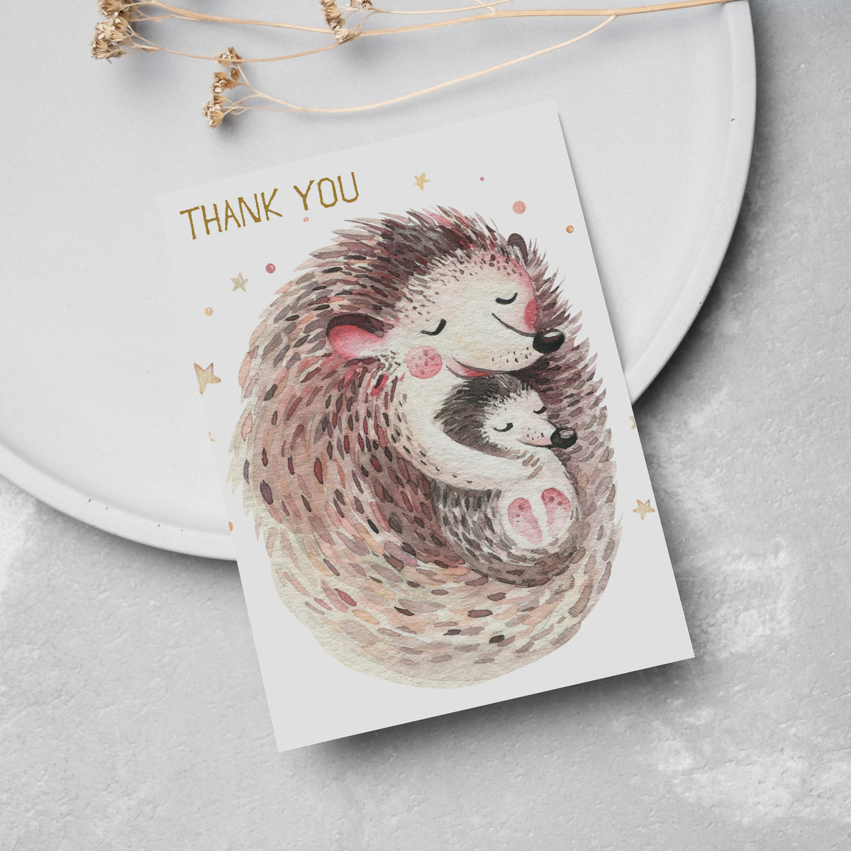 Set of 24 cards with watercolor hedgehog, bear, deer, and owl parent-and-baby designs on neutral backgrounds.