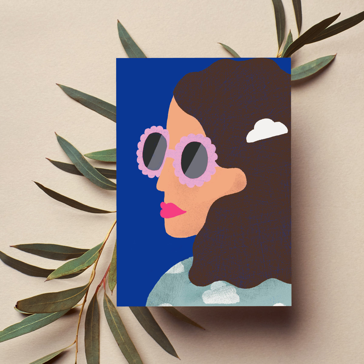 Card set with women illustrated in scalloped, daisy-frame, and heart-shaped sunglasses designs.