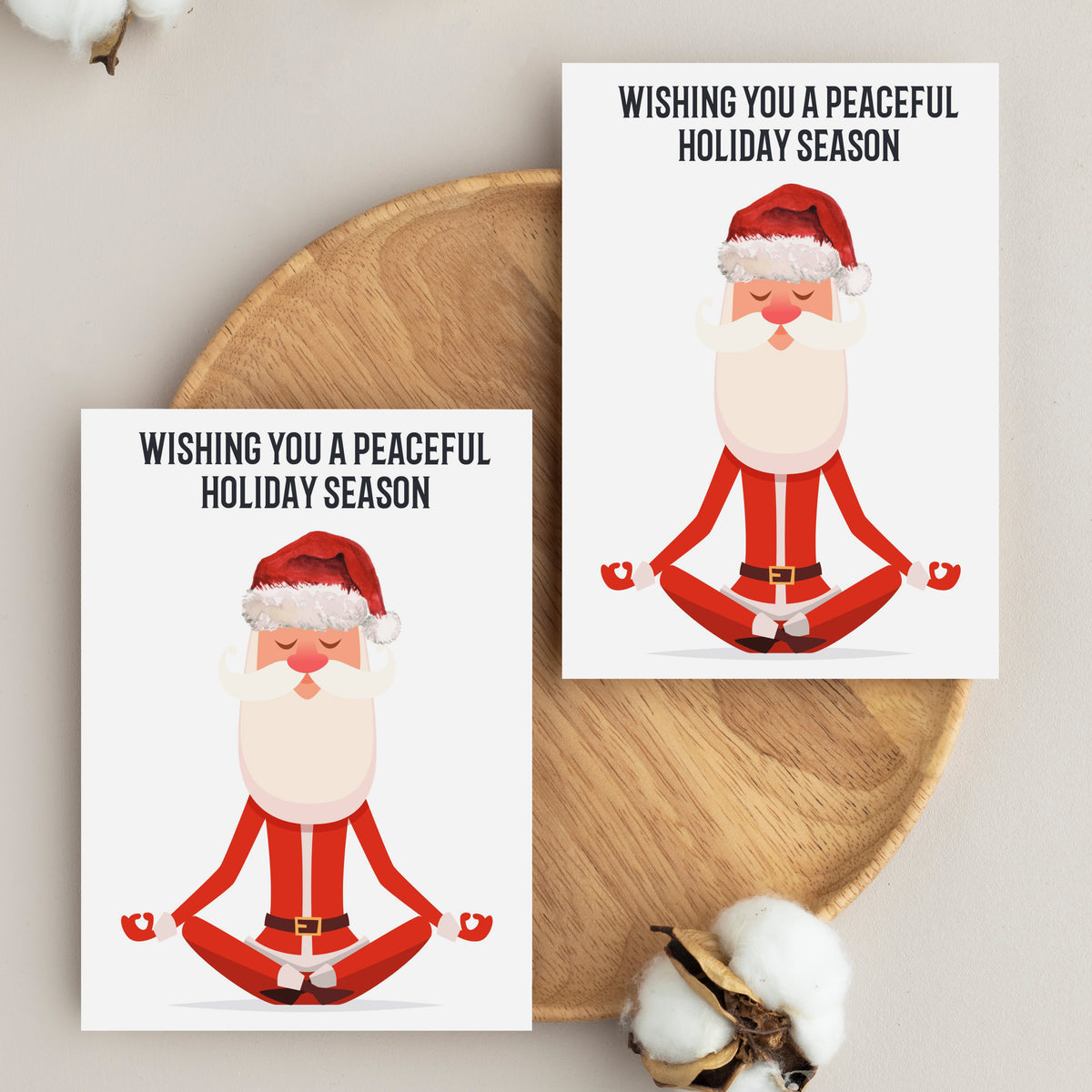 Single-design holiday card pack of 24 showing Santa Claus sitting cross-legged with eyes closed.