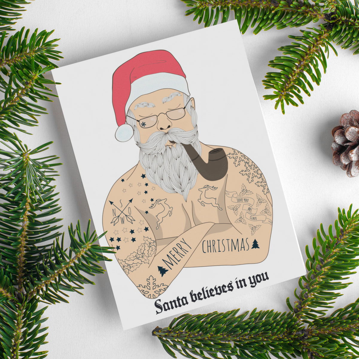 Holiday cards, 24 count, illustrated Santa with tattoos reading Merry Christmas across forearms and Love You Mr Claus on shou