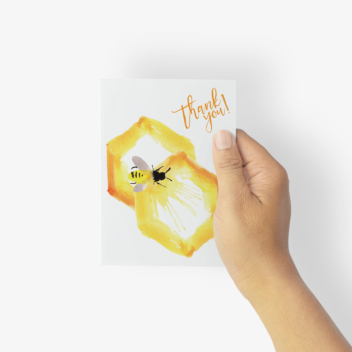 Boxed set of 24 white thank you cards with centered bee and honeycomb illustration.