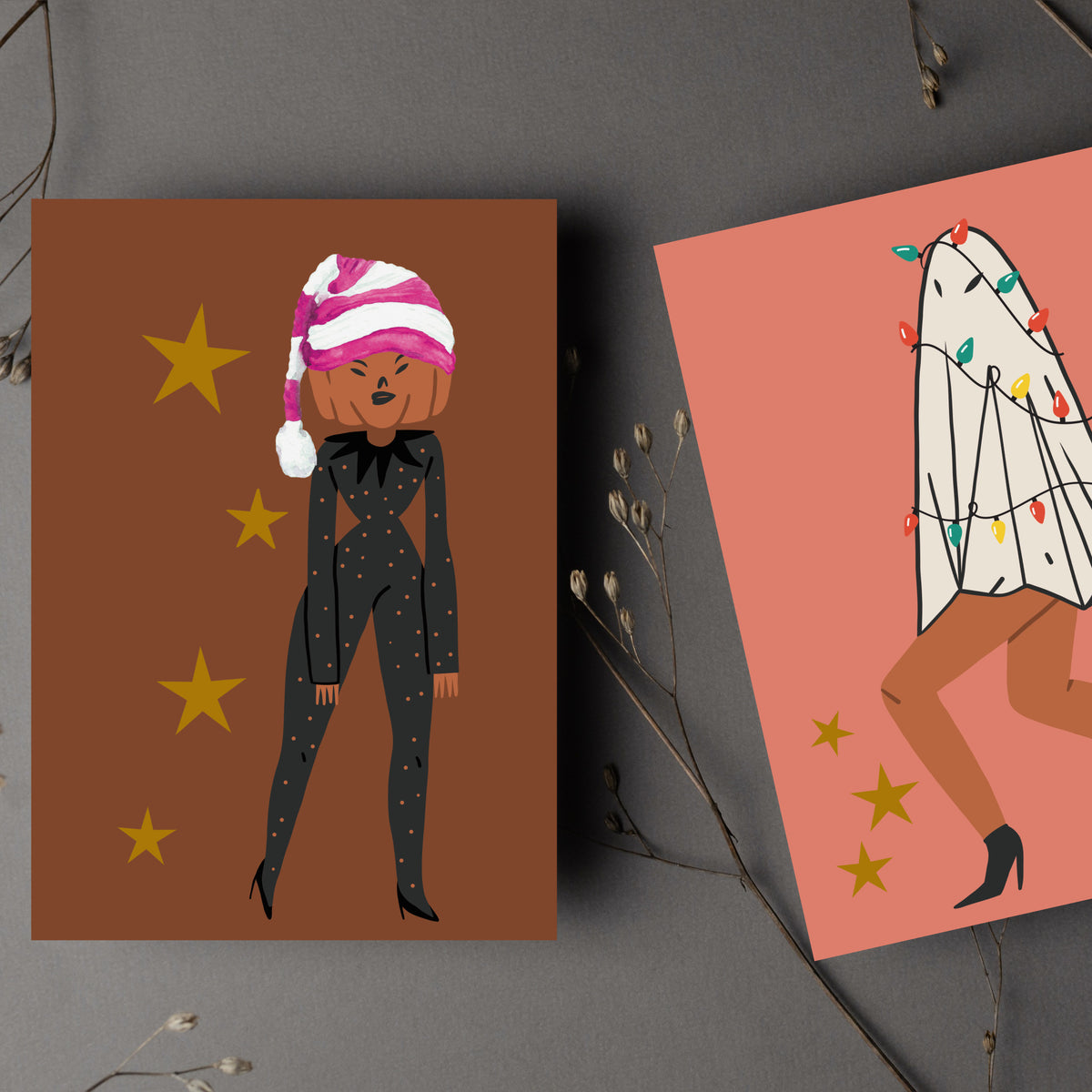 Greeting cards showing single flat-fill female figures in festive and Halloween costumes on solid colour grounds.