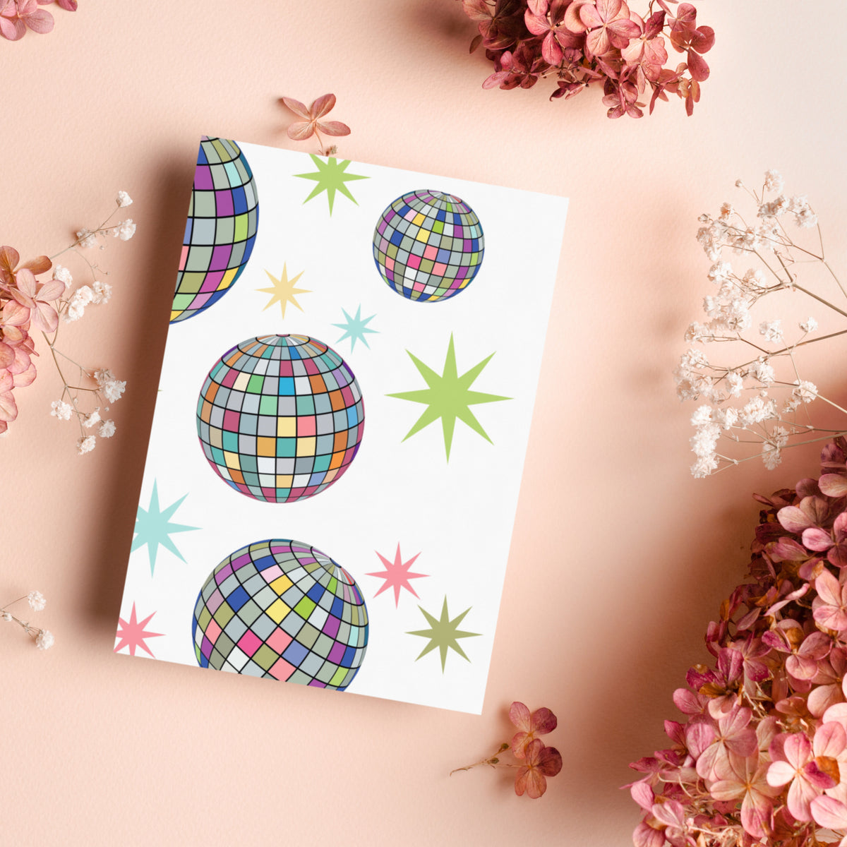 Christmas card set with mirror ball and tree designs on white, pink, aqua, and light blue backgrounds.