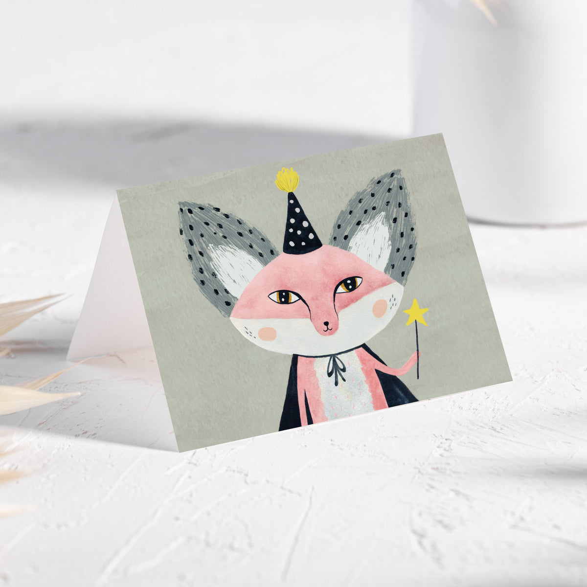 Set of 24 cards featuring a fox in a polka-dot conical hat and dark navy cape, holding a black wand with a yellow star.