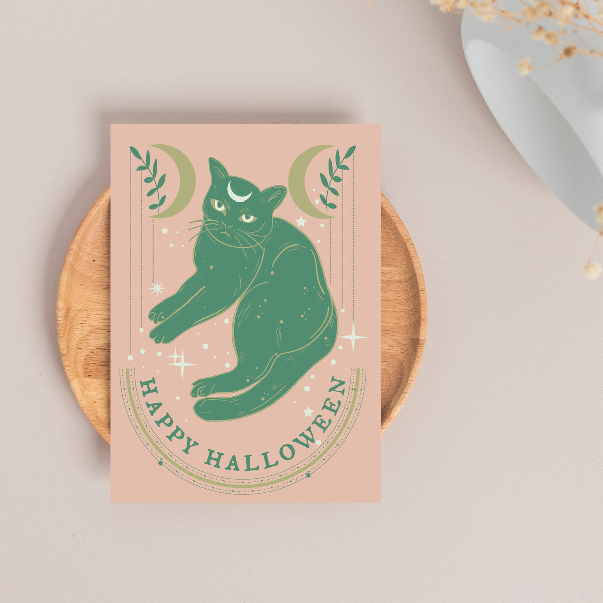 Boxed set of 24 Halloween notecards with a central green cat and botanical accents.