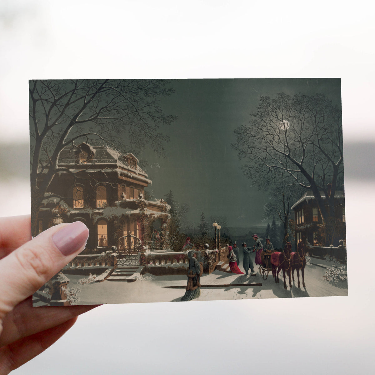 Christmas card set of 24 featuring a 19th-century-style winter night scene with a lit mansion and carriage.