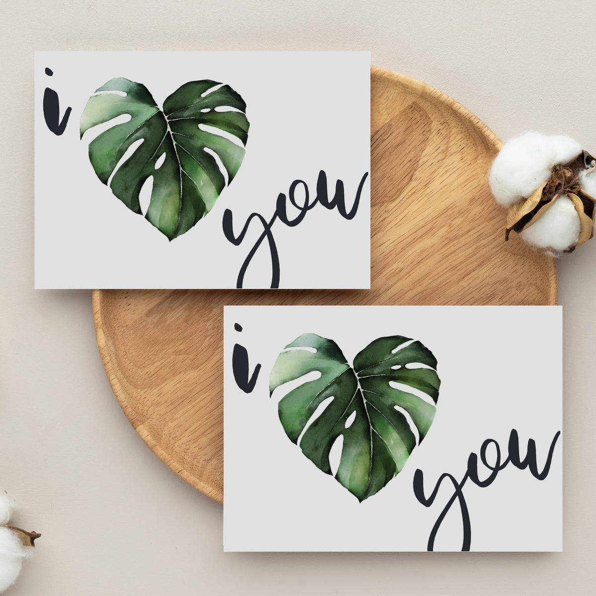 Pack of 24 white cards with a minimalist green monstera heart leaf and lowercase black script text.
