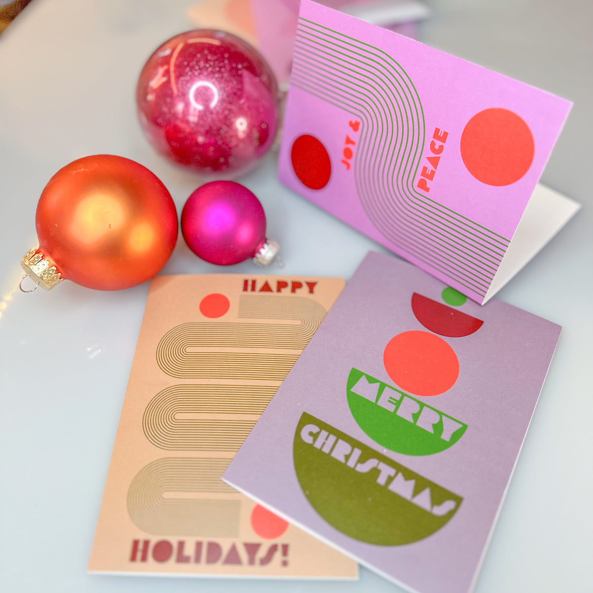 Card set including Merry Christmas, Happy New Year, Happy Holidays, and Joy & Peace designs.