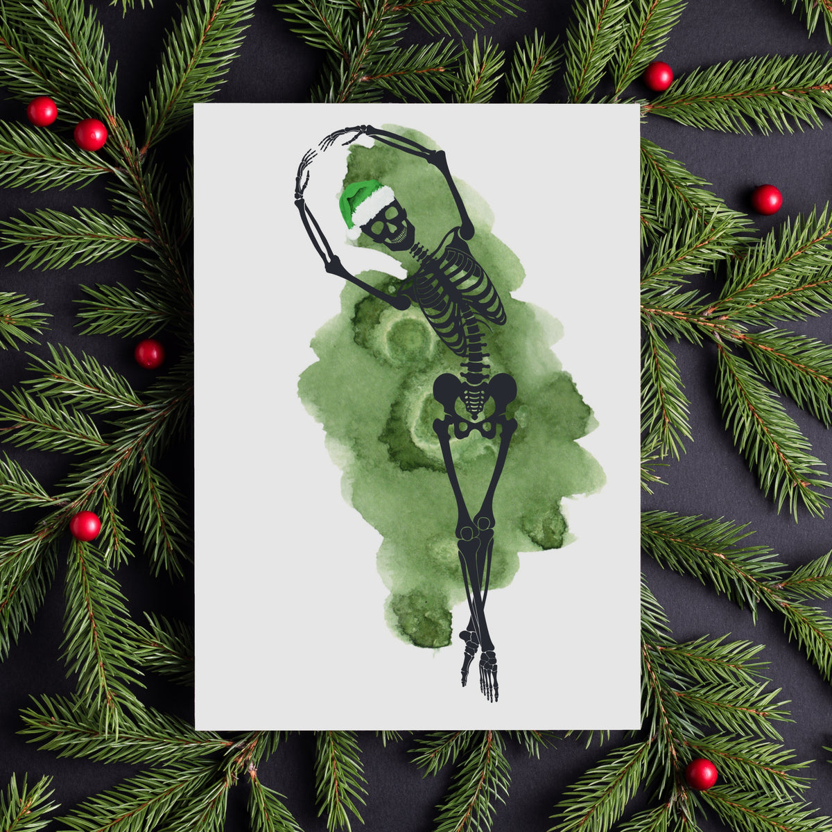 Christmas card set with black line art skeletons in dance poses, each wearing a small patterned santa-style cap.