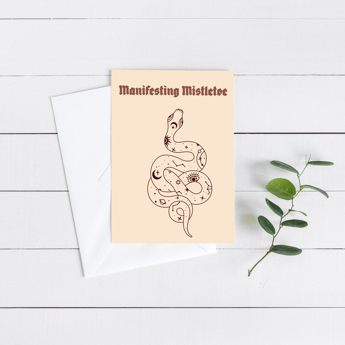 Hand-drawn line-art Christmas cards with phrases including "Cosmic Christmas Charms" and "Moonlit Mindfulness."