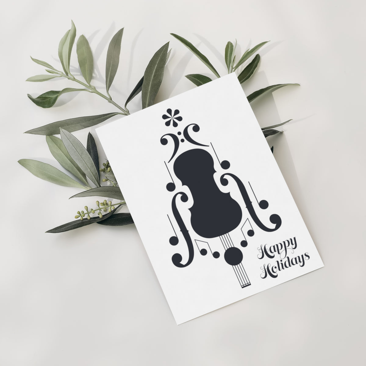 Two-design card set, 12 each: white-on-black and black-on-white versions of a notation-built string instrument graphic.