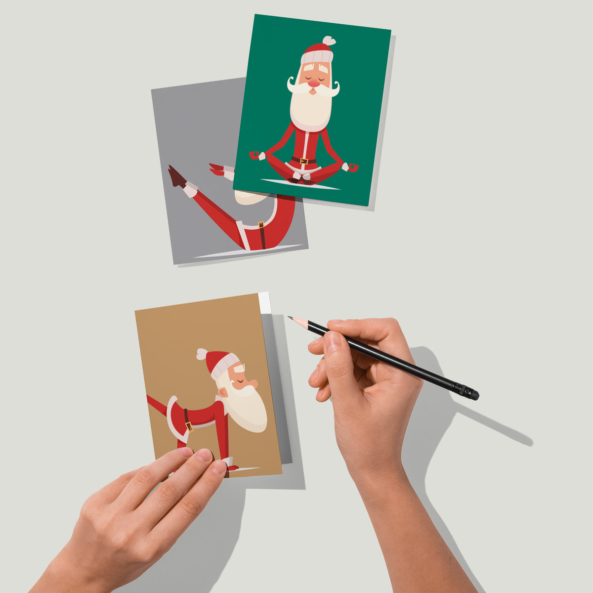 Six-design Santa yoga Christmas card assortment, 4 cards per design, portrait orientation, no printed text.