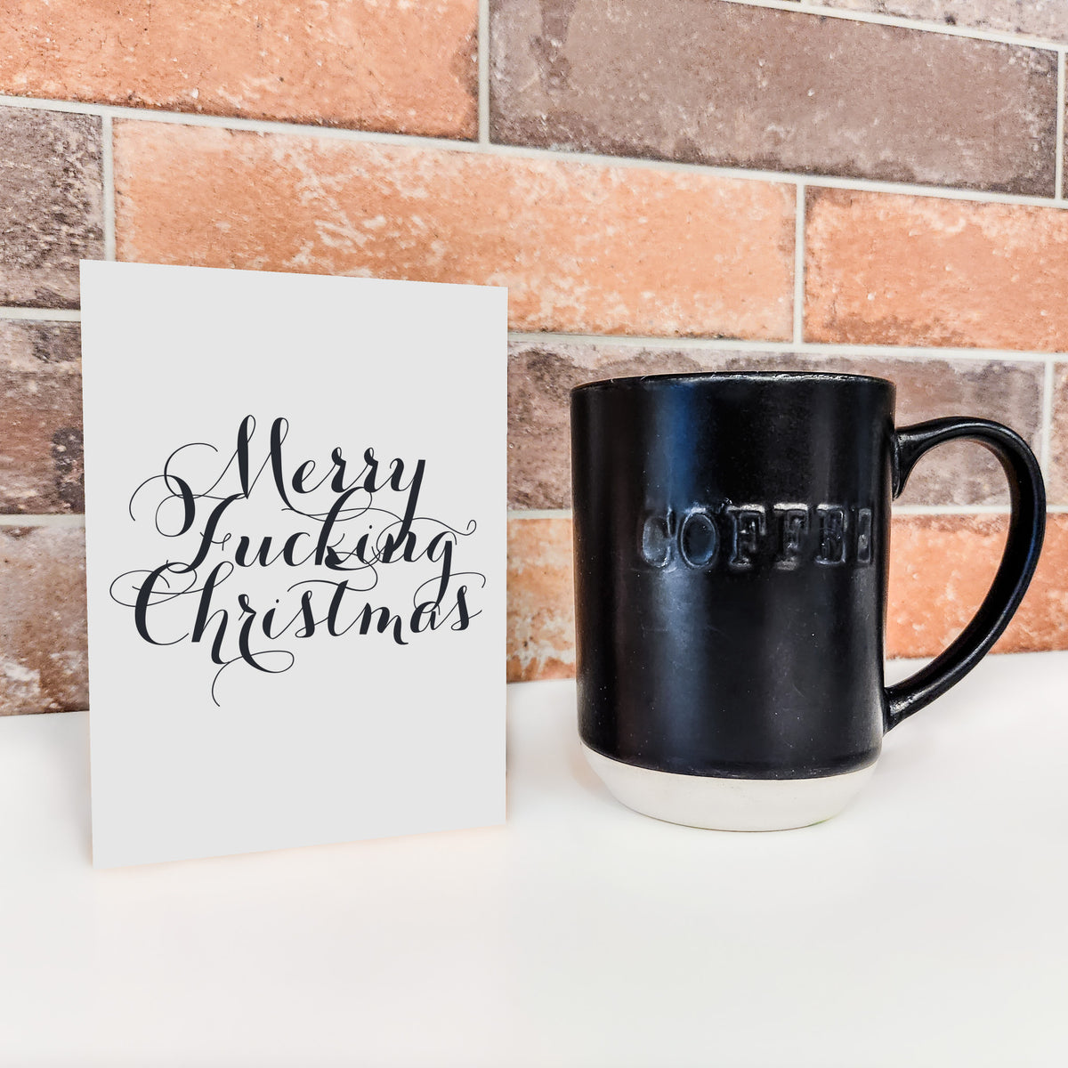 Four-design Christmas card set, 6 cards per design, alternating black and white cardstock with white and black text.
