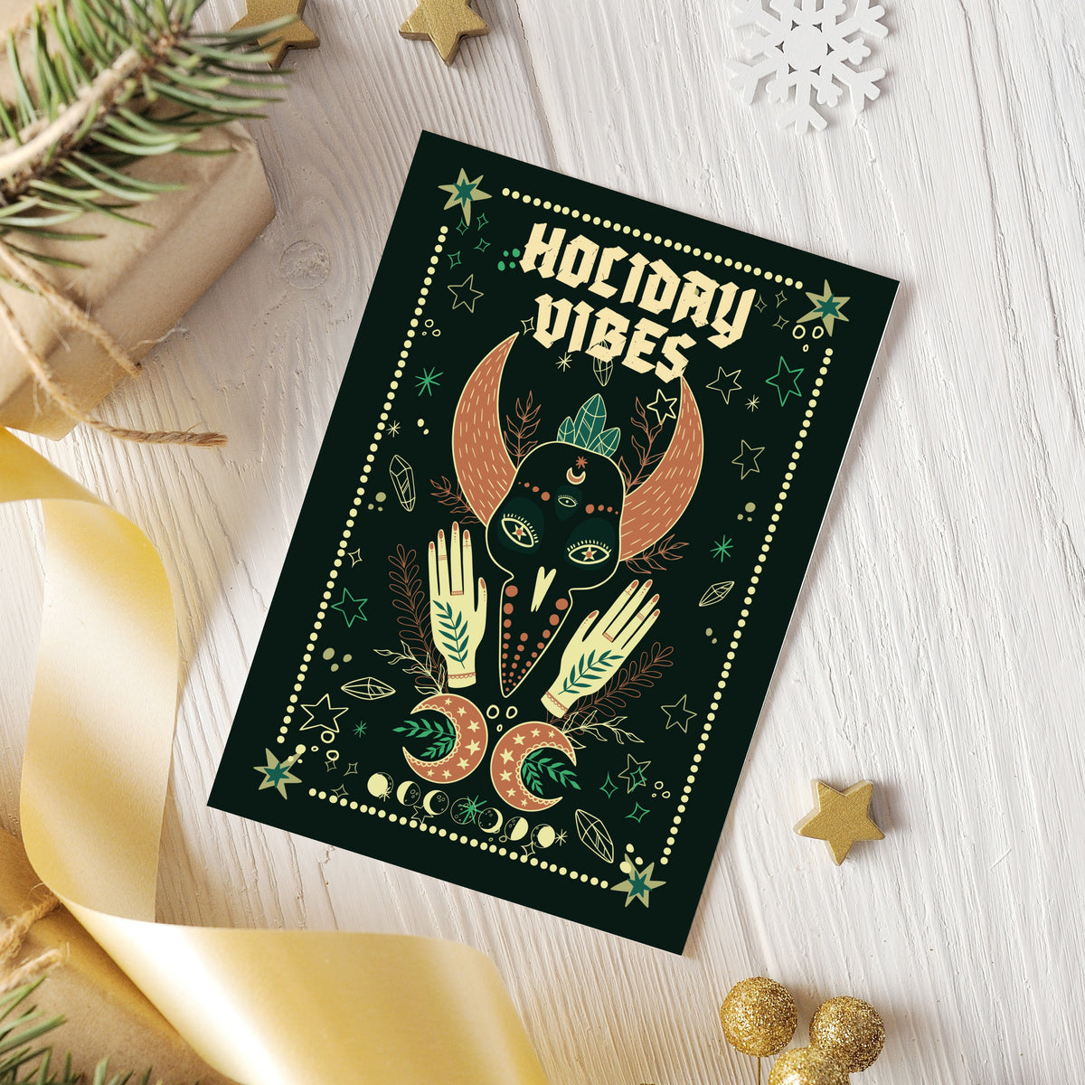 Occult-themed Christmas cards with terracotta crescent moons, spotted mushrooms, crystals, and star accents throughout.