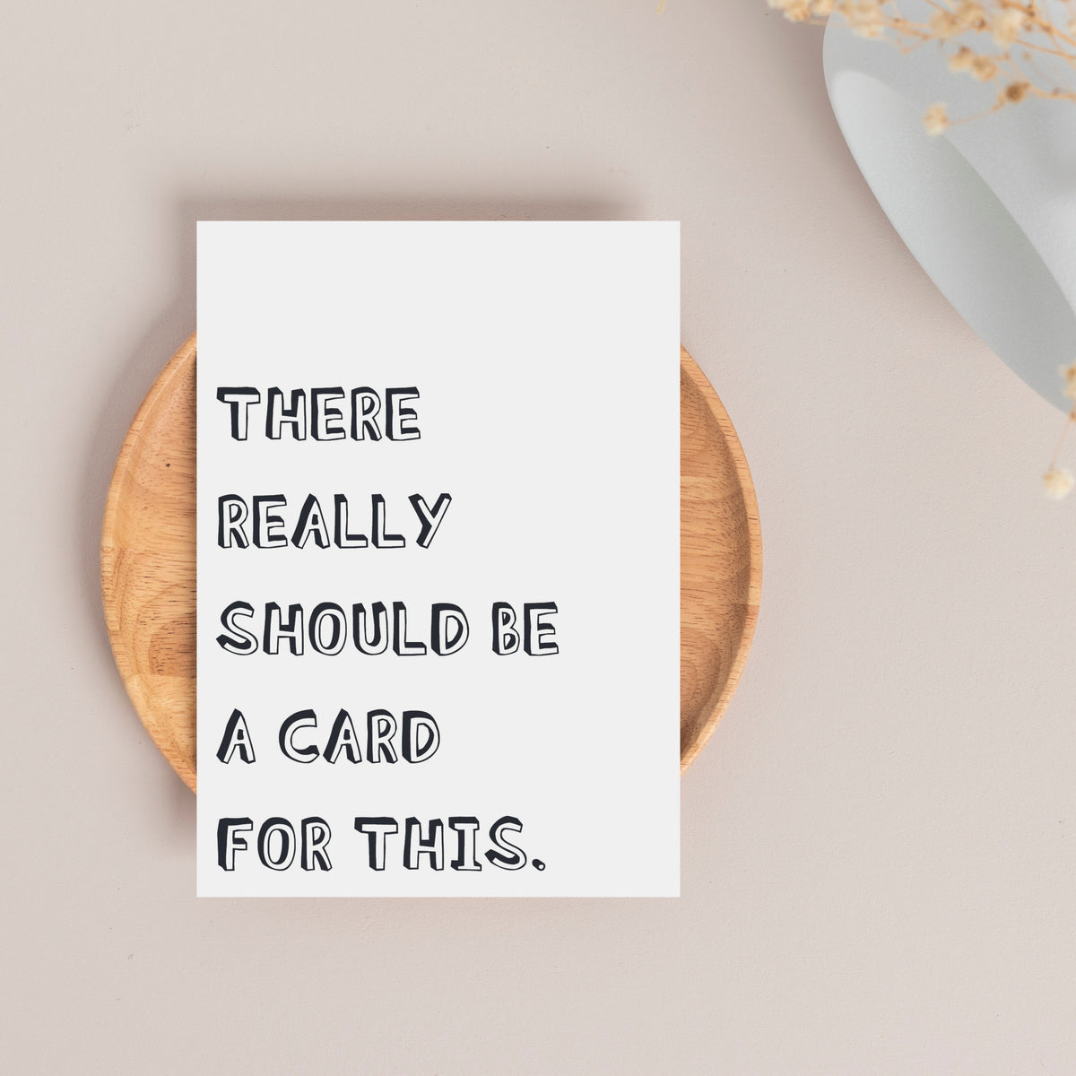 Four-design card set with all-caps block lettering in two distinct typographic styles, black on white.