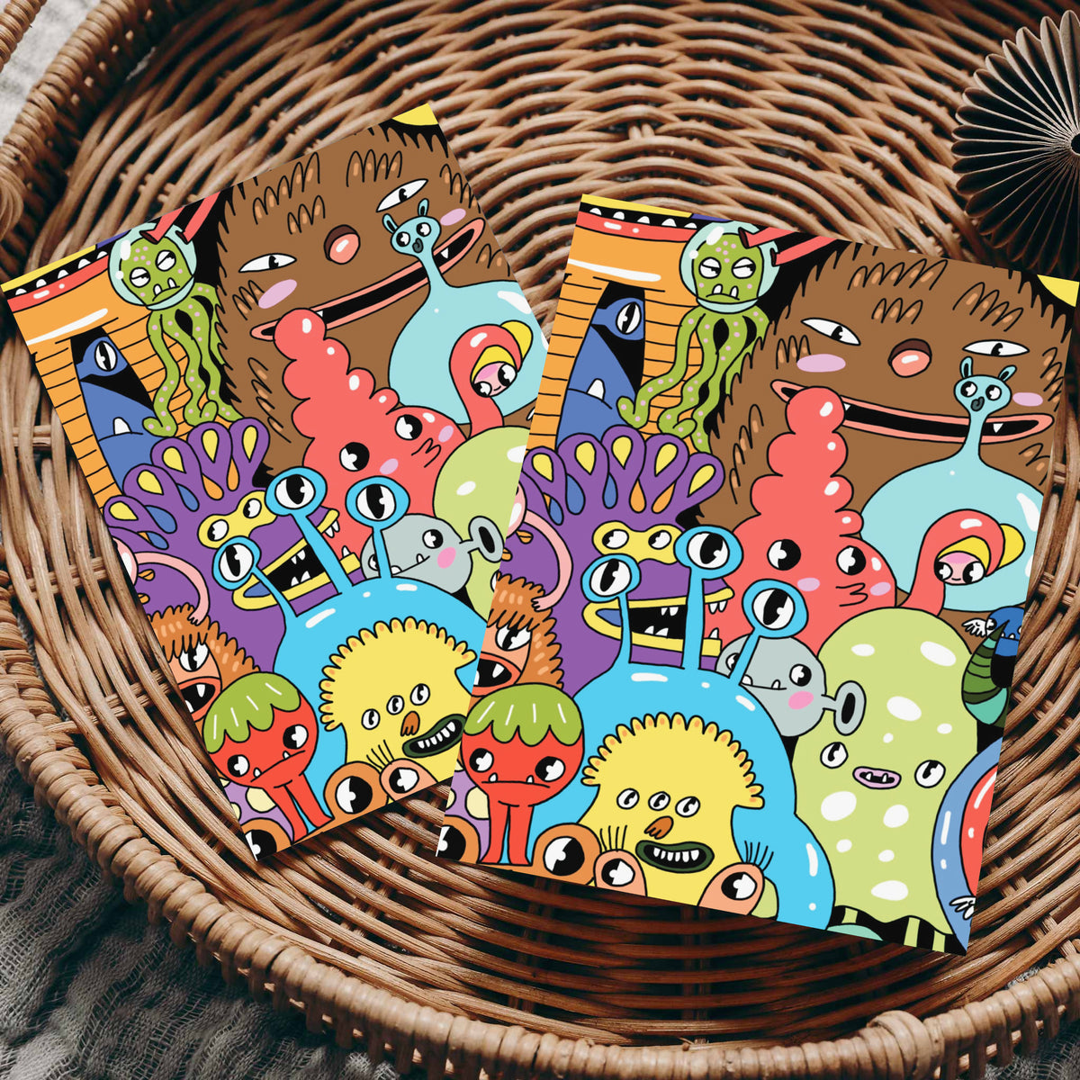 Full-bleed cartoon monster illustration covering the front of each card in this 24-piece set.