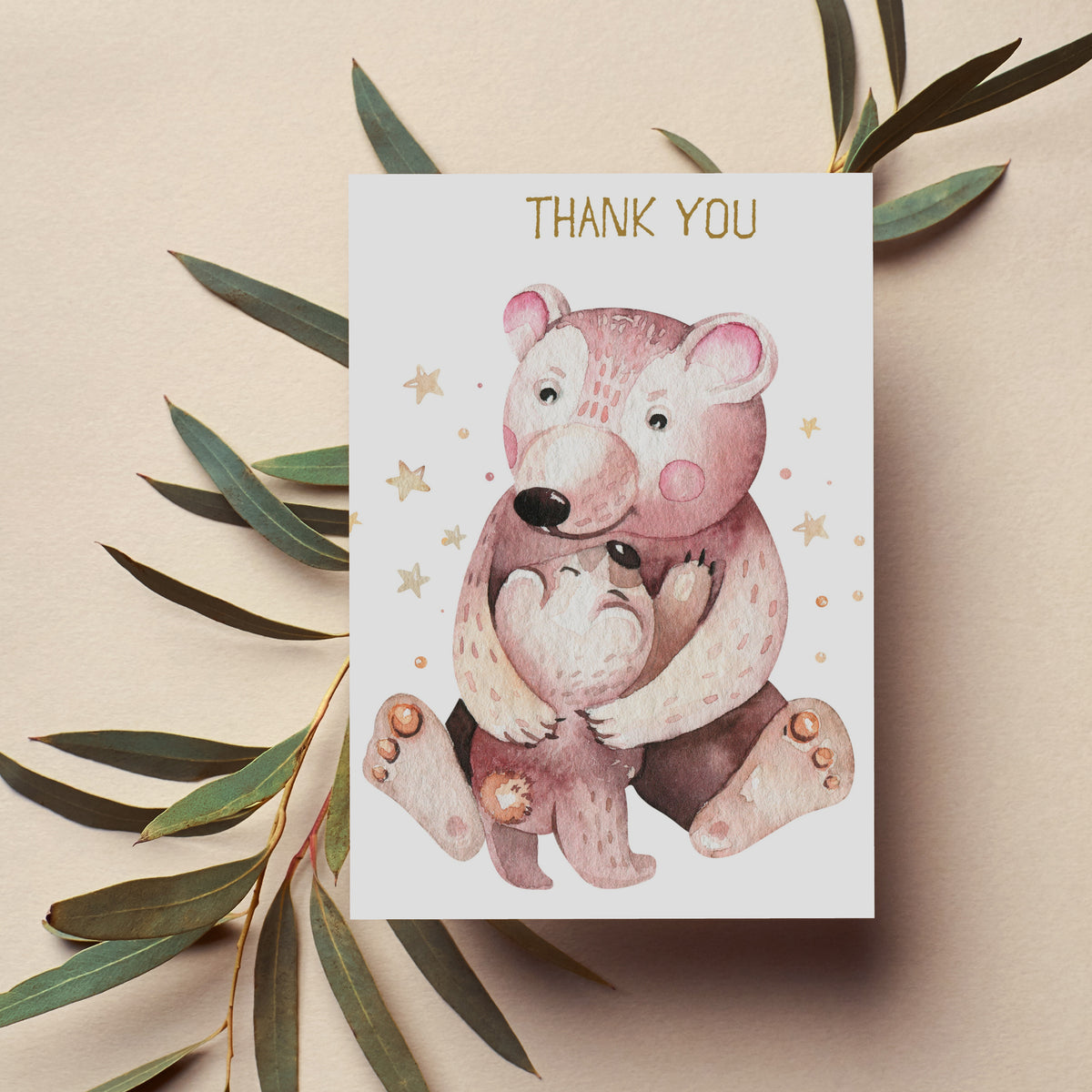 Gold "THANK YOU" text on illustrated animal cards featuring parent-and-baby pairs in blush and cream tones.