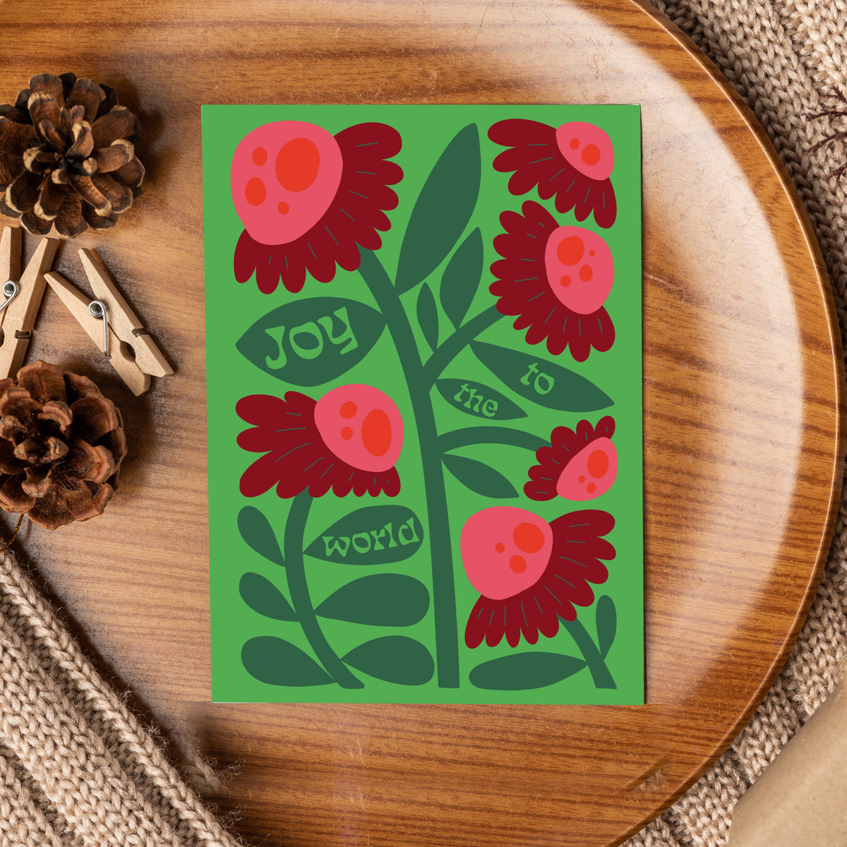 Holiday card set with retro floral illustrations in dark green, red, pink, orange, yellow, and bright green.