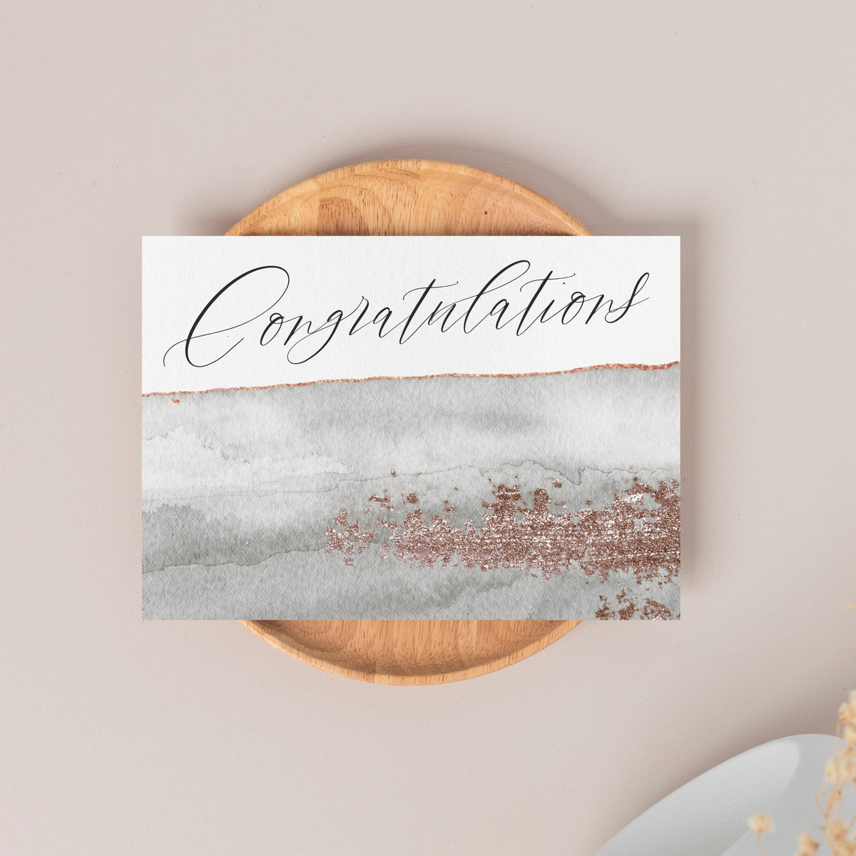 Pack of 24 matching cards printed with "Congratulations" in calligraphy-style script and abstract watercolor-style background.