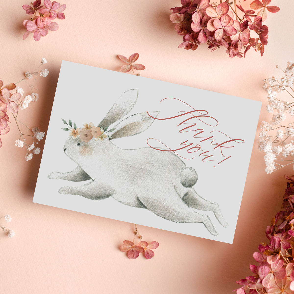 Thank you card set with rabbit illustration on left and script text in upper right.