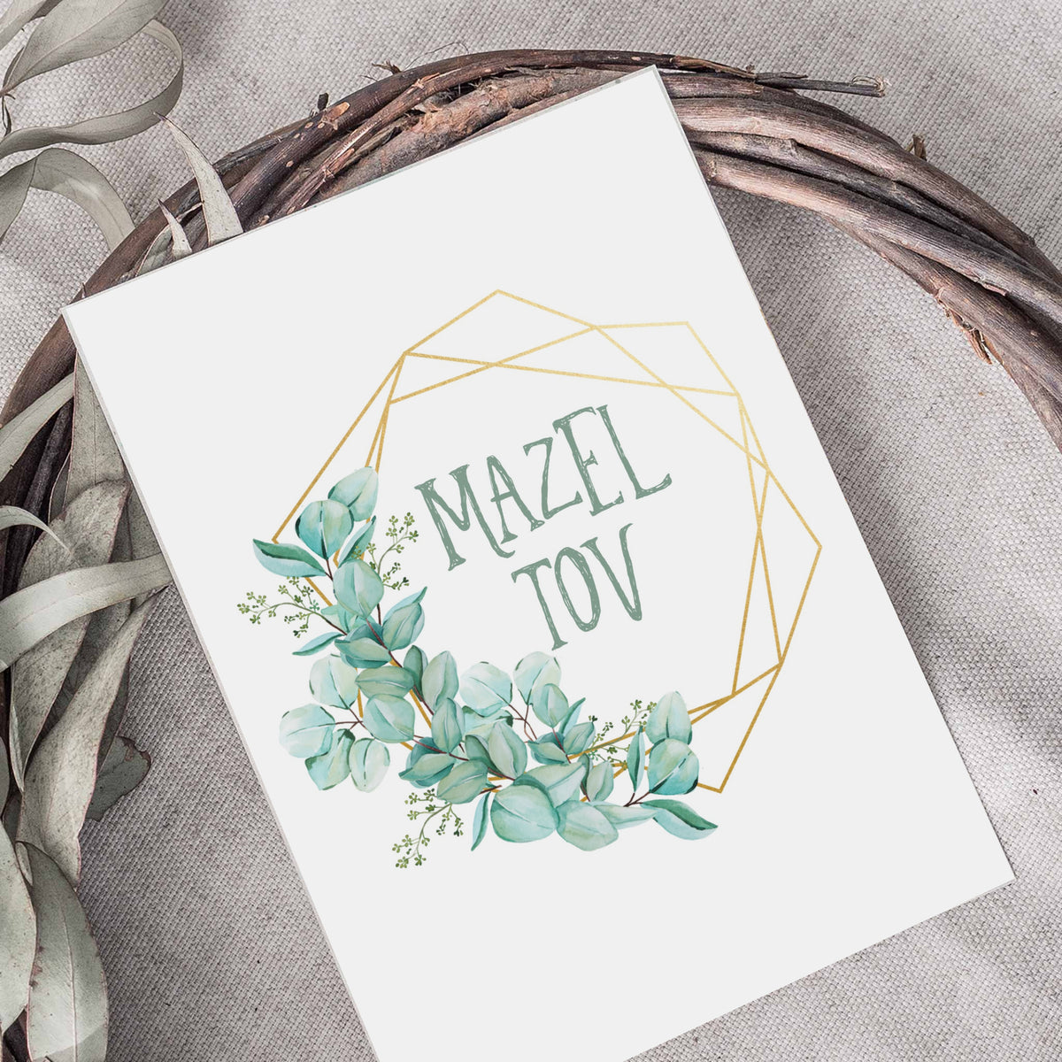 Mazel Tov card set with watercolor-style eucalyptus clusters and oval geometric frames on white backgrounds.