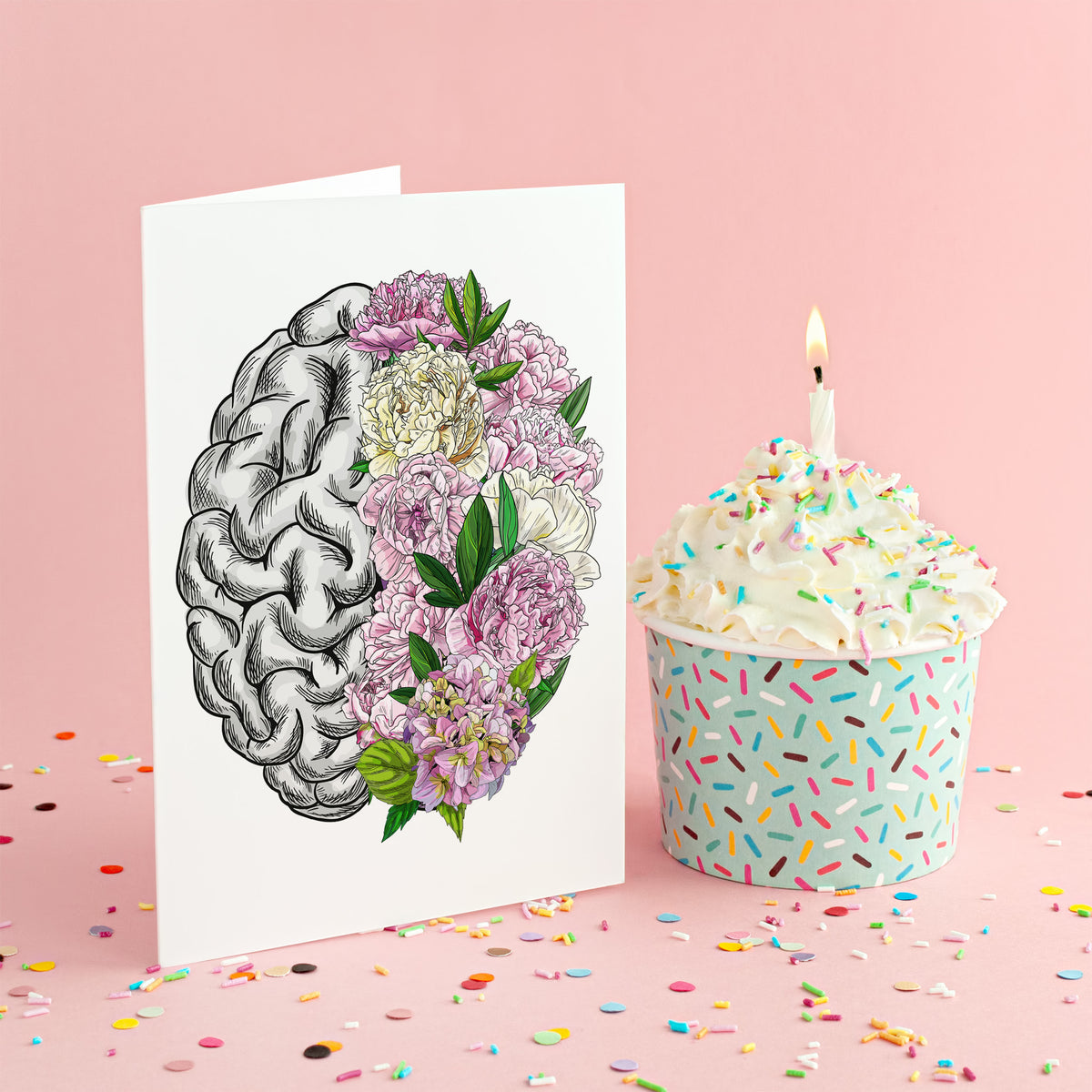 Single-design card set showing a vertically divided brain, one side rendered in stippled linework, the other in botanical flo