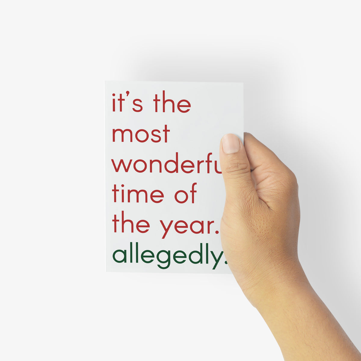 Pack of 24 matching Christmas cards with geometric sans-serif text in red and dark green on white.