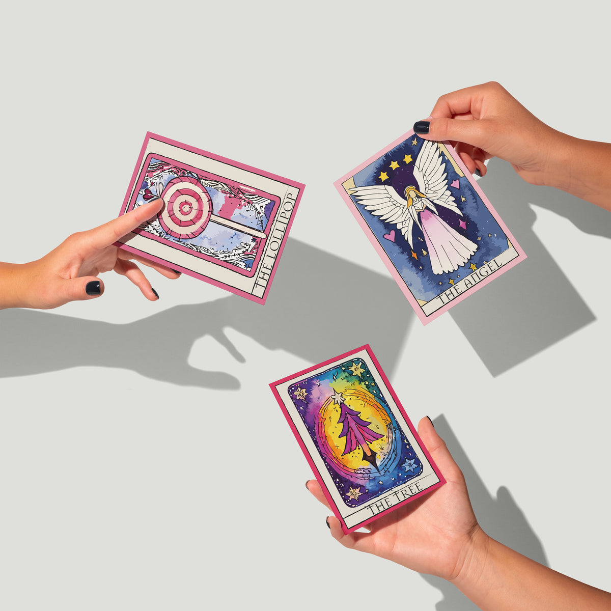 Individual Christmas card designs, each portrait-oriented with a colored border and bottom title box.