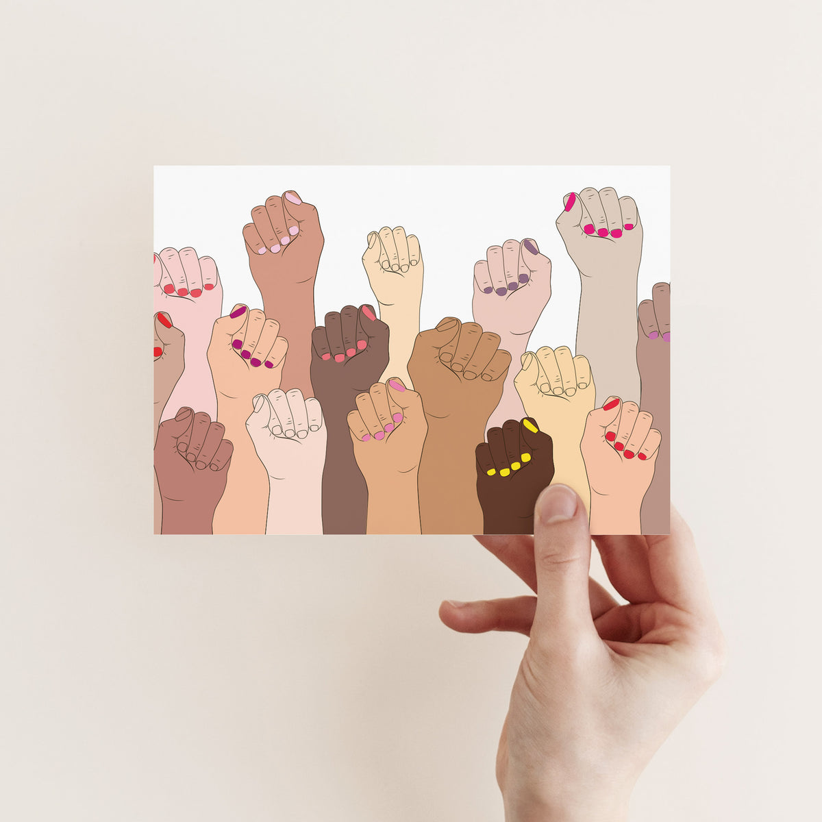 Cards showing raised fists and forearms in diverse skin tones with nail colors including red and violet.