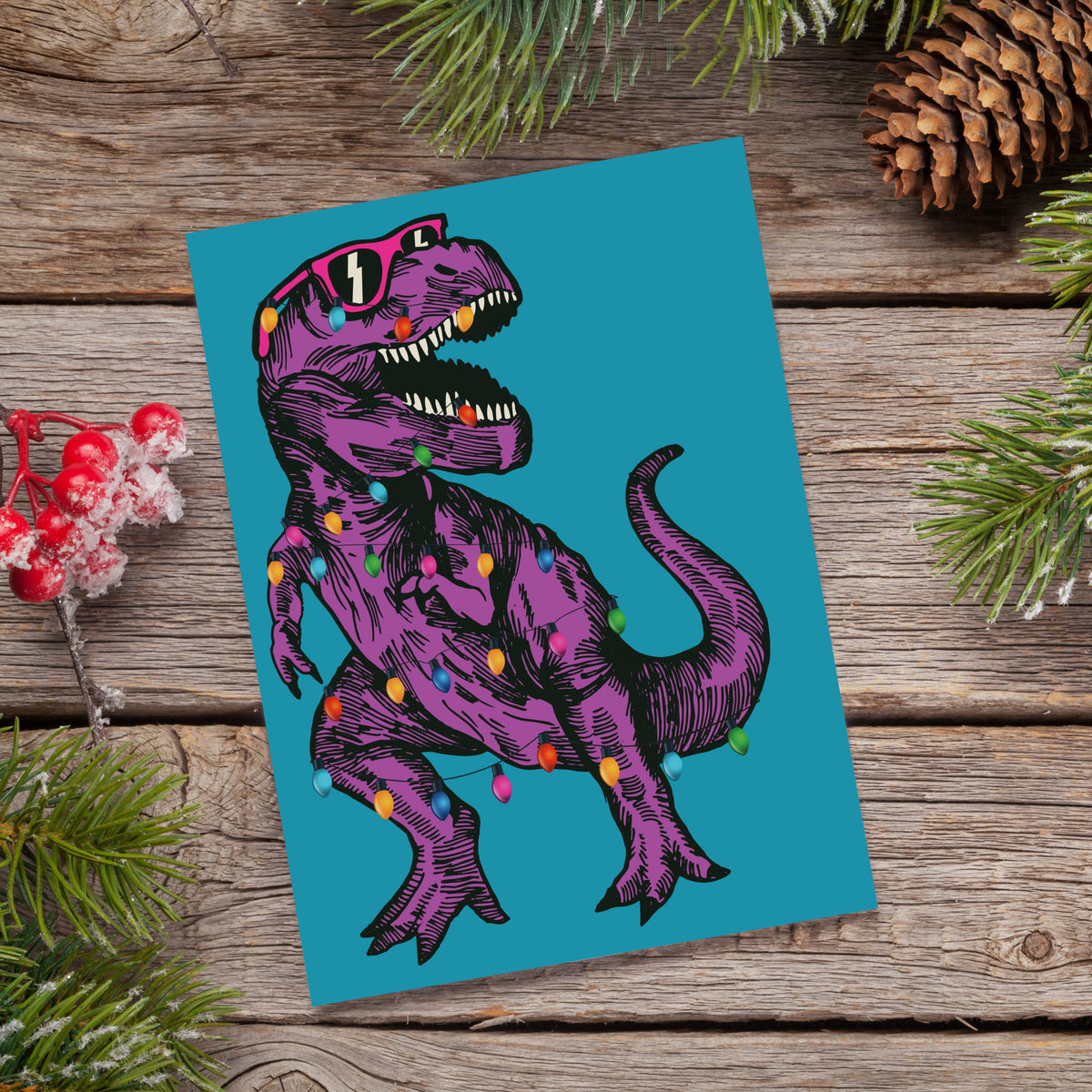 Christmas card multipack with animal illustrations including a koala, llama, sloth, and spotted big-cat cub in winter accesso