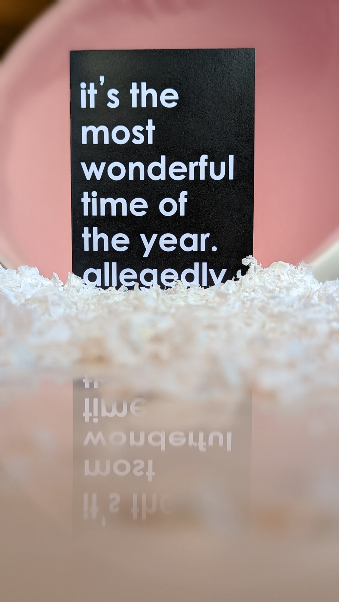Black cardstock holiday card reading "ho ho holy shit what a year" in bold white sans-serif text.