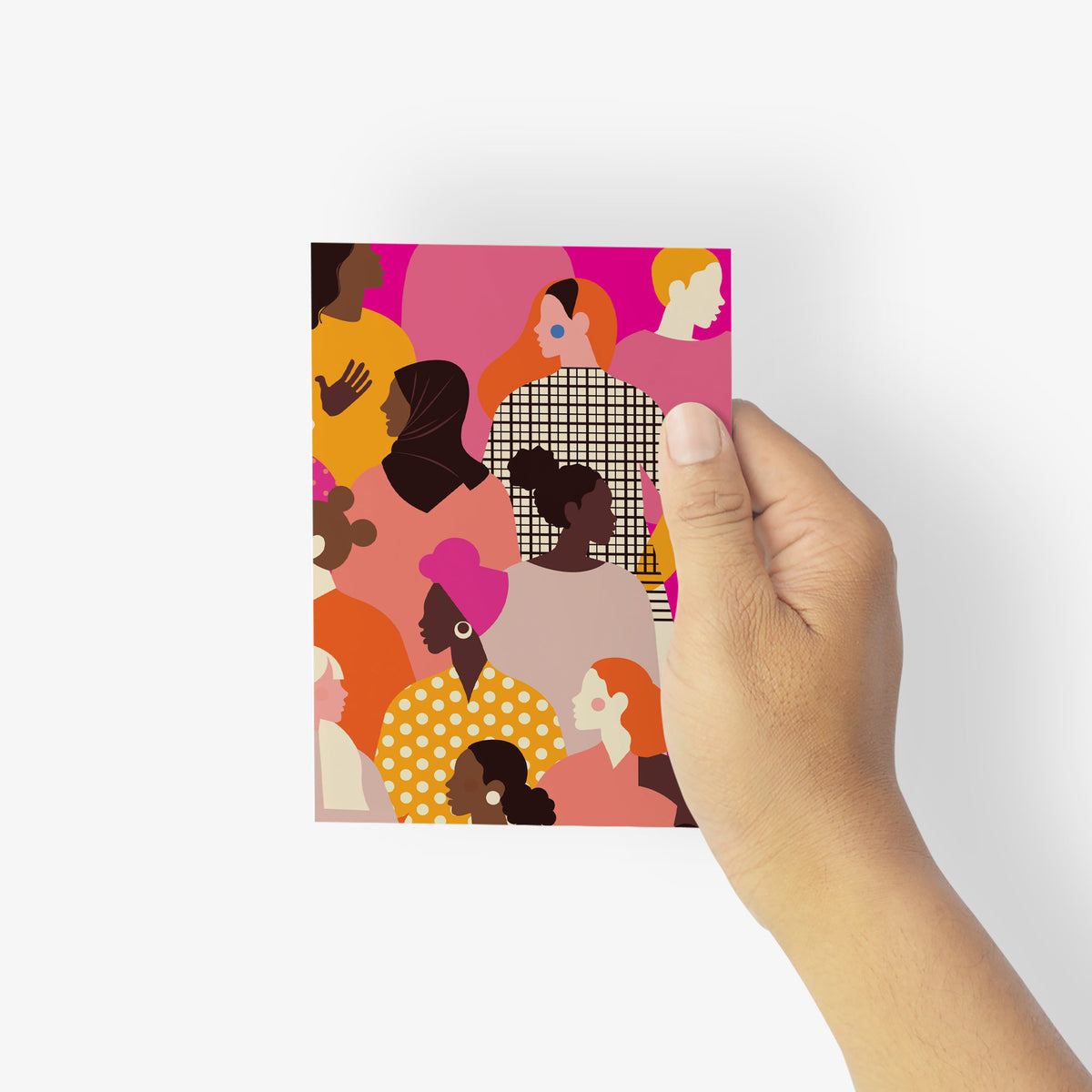 Women figures with skin tones from deep brown to pale cream on a hot pink and coral patterned card.