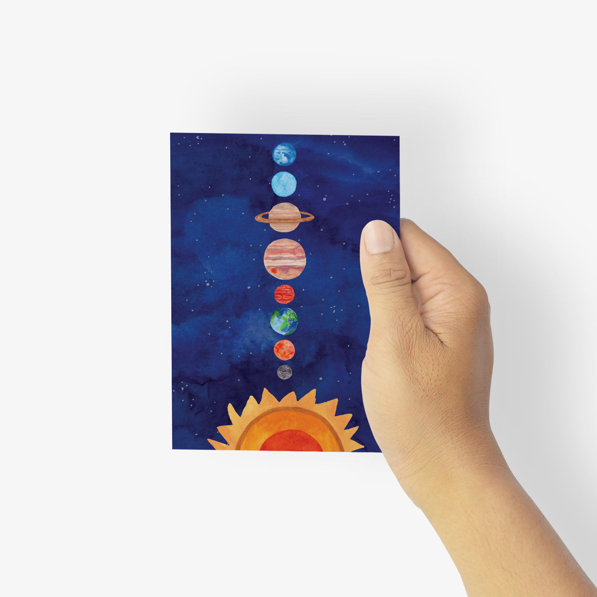 Boxed set of 24 identical cards with a full-bleed solar system illustration including Jupiter's red spot and Saturn's rings.