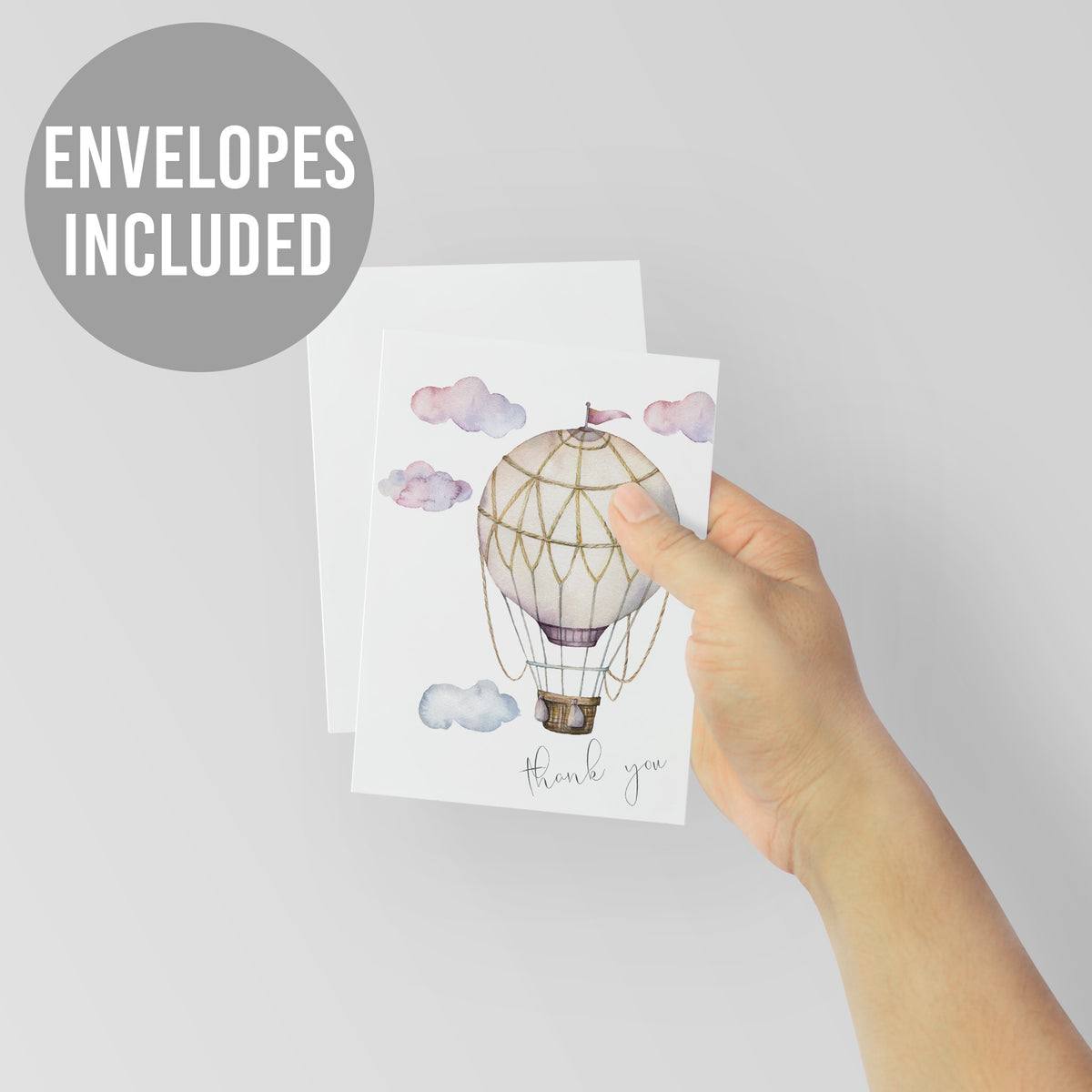 Watercolor hot air balloon and pastel clouds printed on a 24-piece thank you stationery card set.
