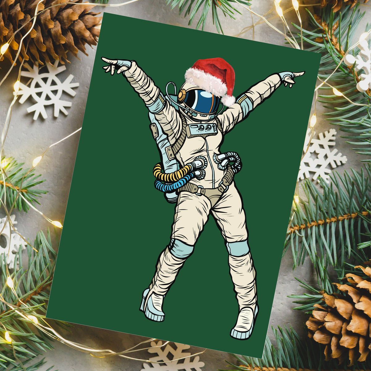 Dark green holiday cards with detailed illustrated astronauts, 24 cards total with matching envelopes.
