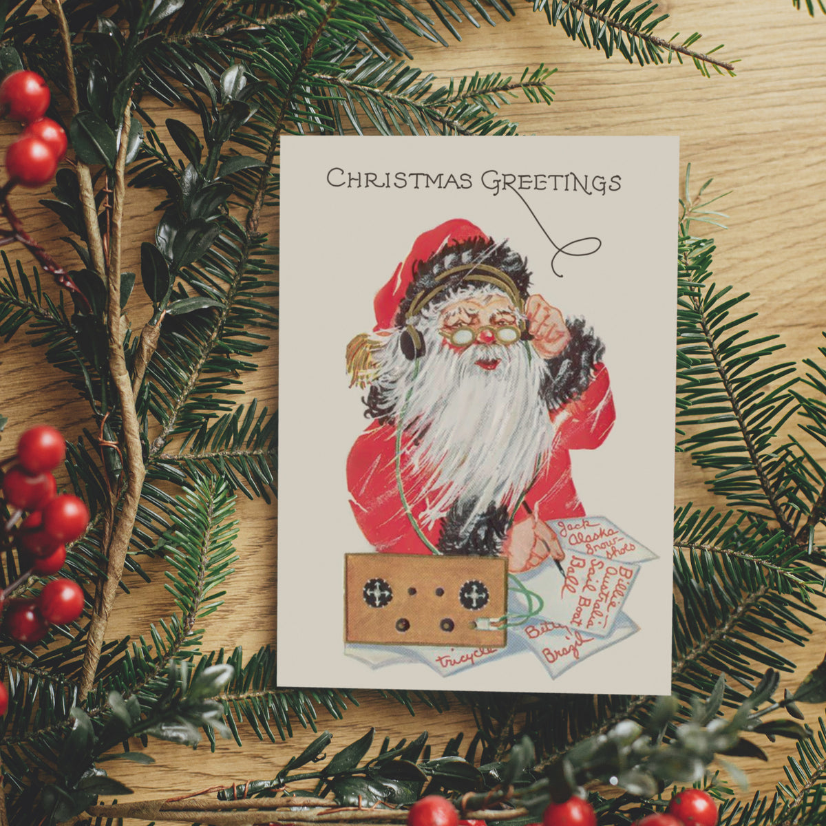 Santa holds one hand to his headphones beside a small crystal radio; "tricycle" printed near the lower illustration.