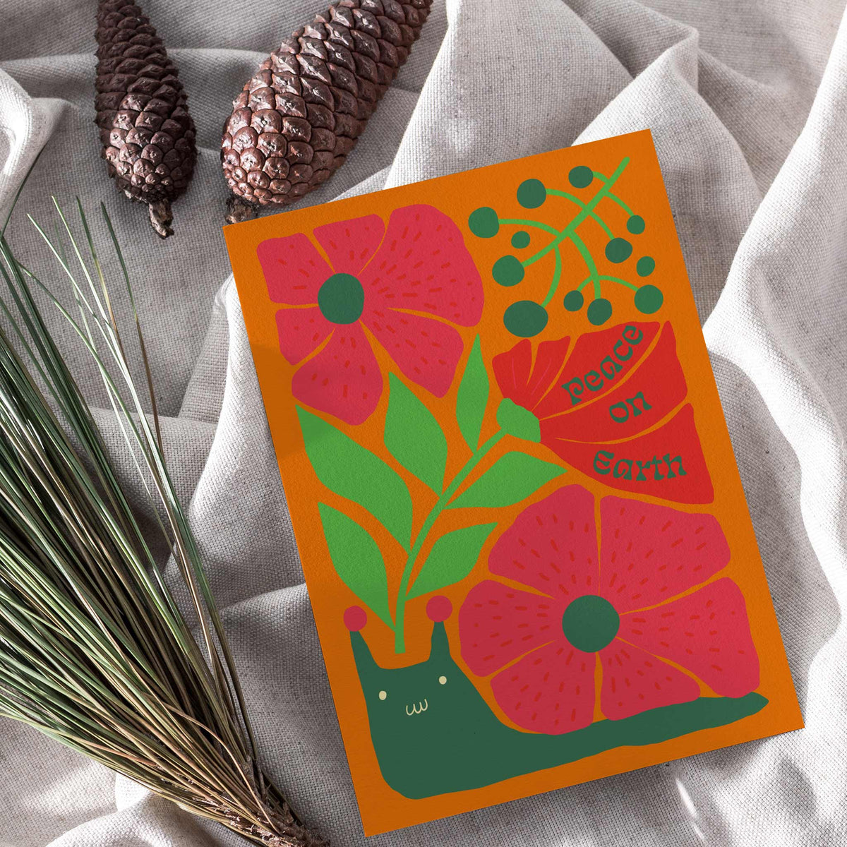 Flat-color flower card designs with phrases including "Peace on Earth," "Happy Holidays," and "Jolly Holly."
