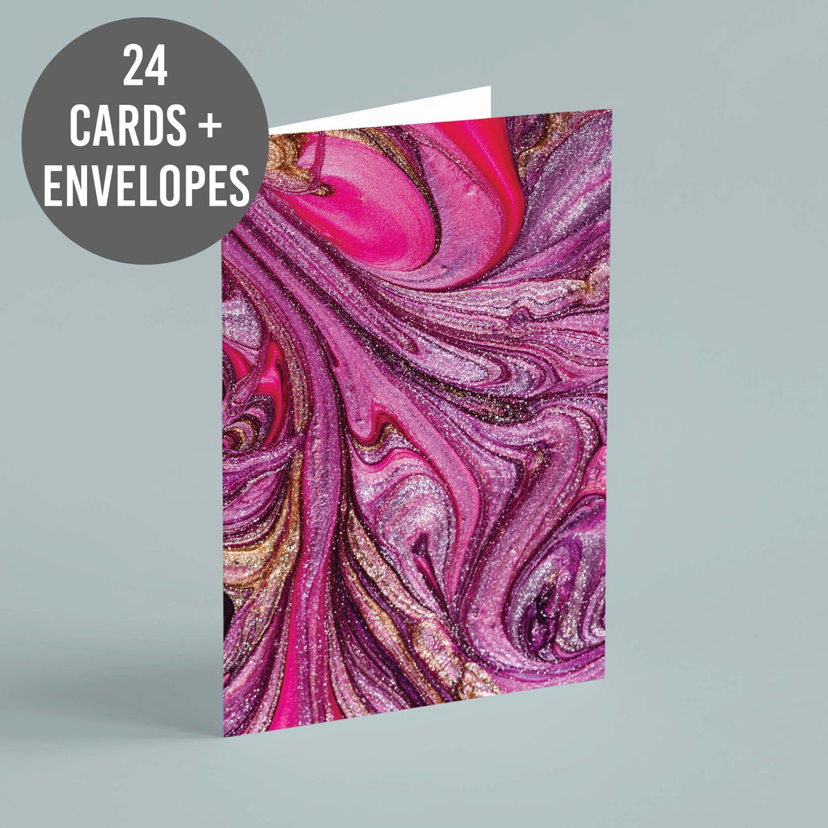 Blank notecards with full-bleed marbled patterns in pink, purple, gold, white, and black.