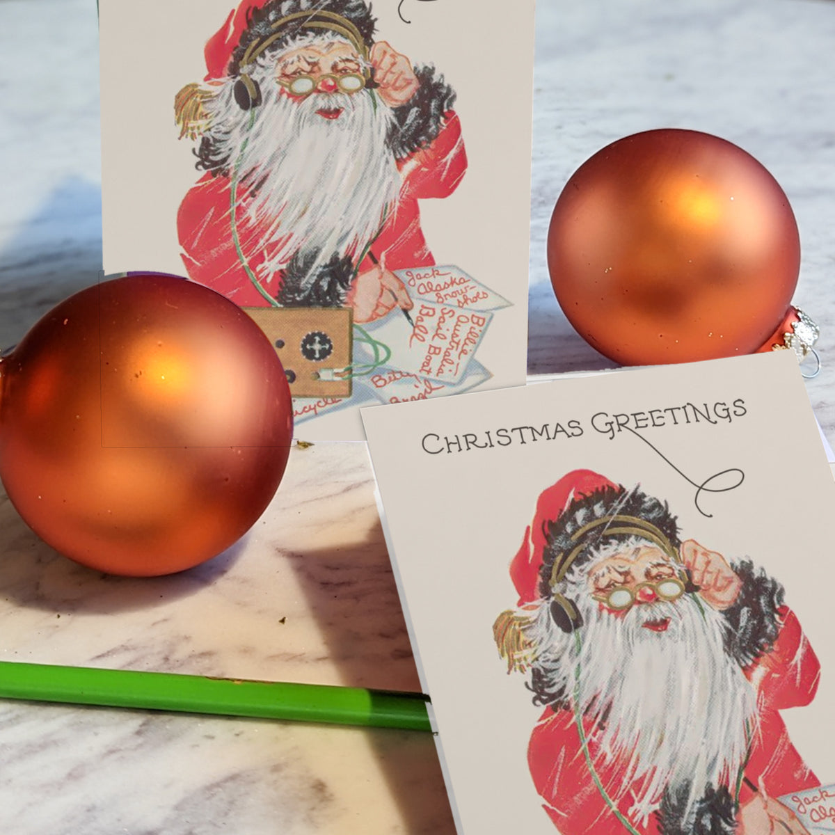 Identical Christmas cards, portrait orientation, full-bleed Santa design with red cursive gift list detail.
