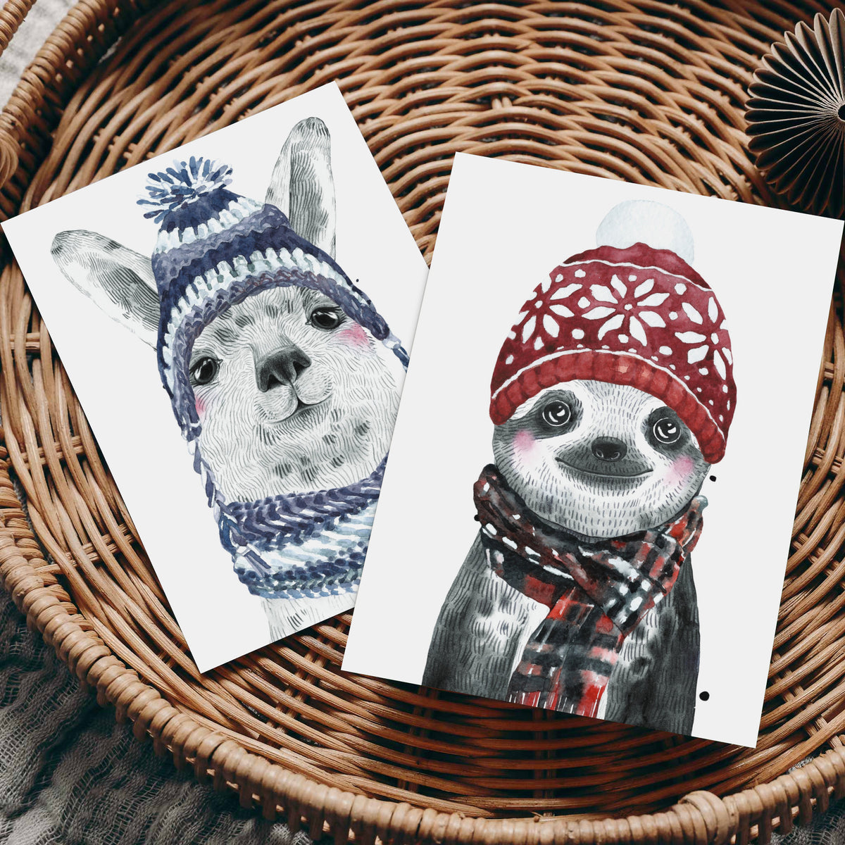 Four illustrated animal holiday card designs, 6 cards each, with pompom hats, scarves, and pink cheek blush.