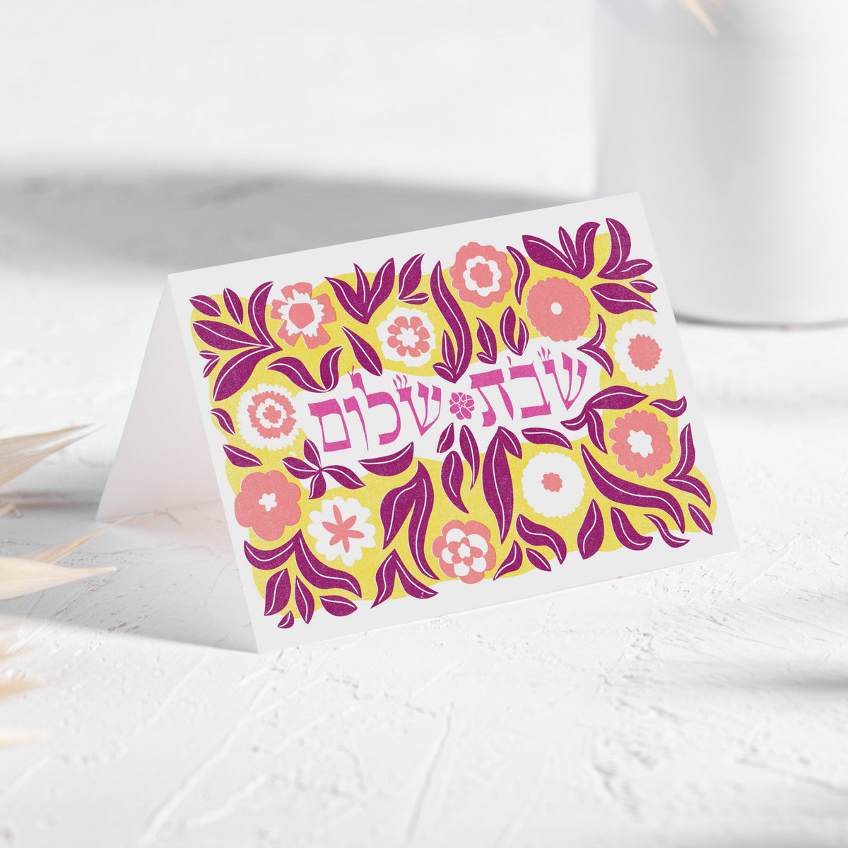 Single-design card set with dense botanical border in peach, magenta, yellow, and purple tones.