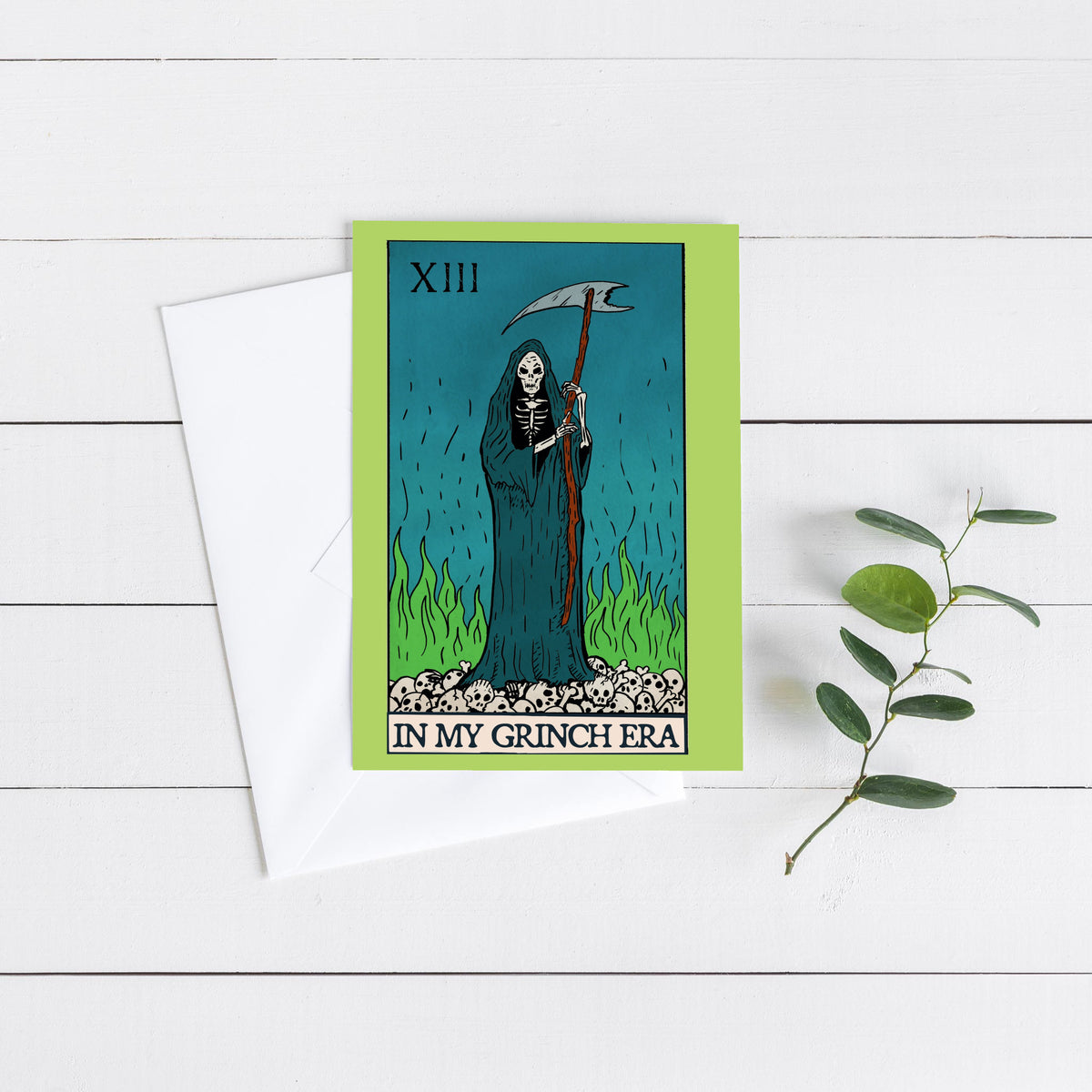 Portrait-format cards with classic tarot layouts, flat-color illustrations, and holiday phrases in black serif lettering.