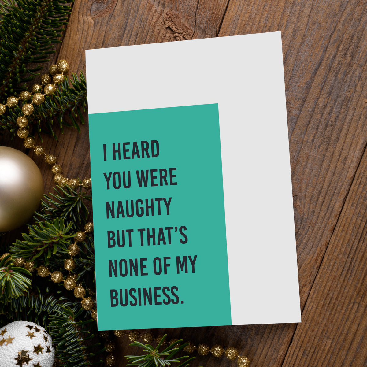 Each card face shows a single solid color rectangle against white, with a humorous Christmas phrase in black sans-serif type.