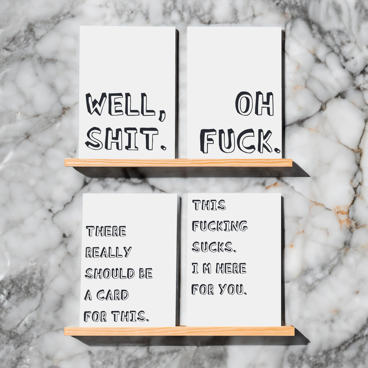 All-caps card designs in two lettering styles: drop-shadow block sans-serif and chunky outlined block lettering.