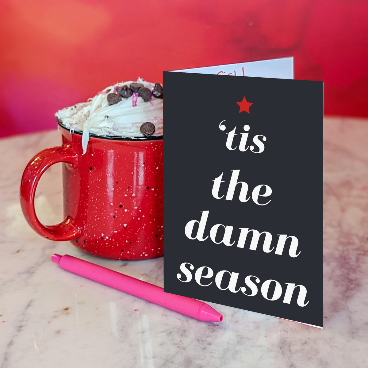 12-design Christmas card set with phrases printed on solid red, white, green, and black backgrounds.