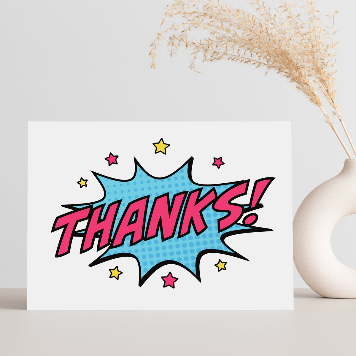 Speech bubble and starburst explosion designs on white landscape-format cards with scattered star and halftone dot accents.