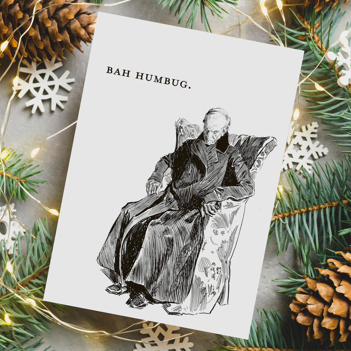 Bah Humbug card set, 24 cards, white background, black hatched illustration of an elderly man in a heavy coat and armchair.