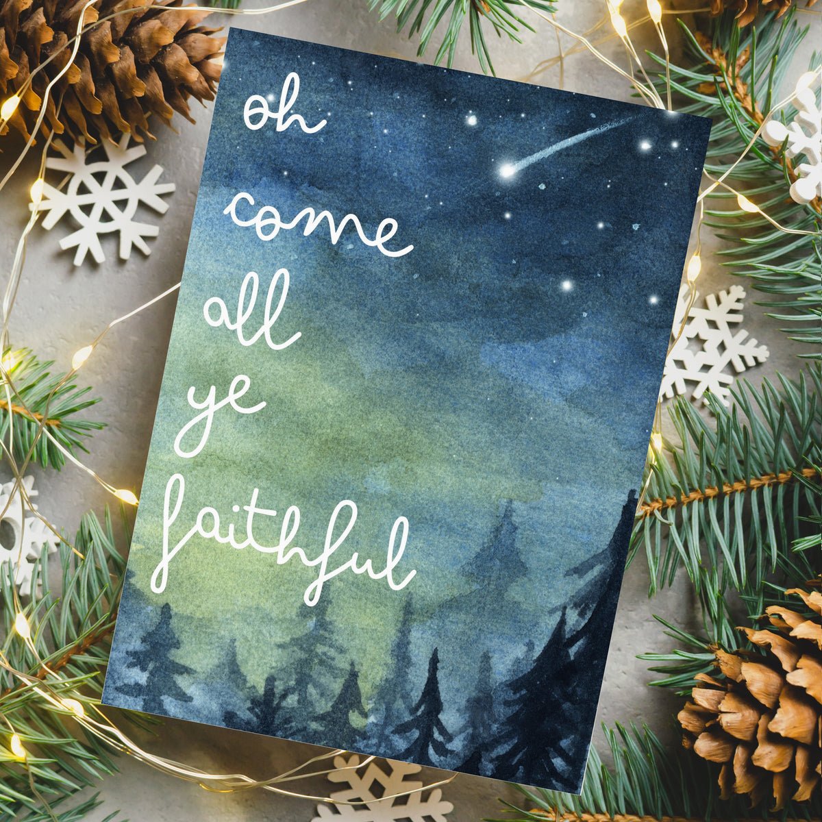 Watercolor Christmas cards with lyrics including "Oh Holy Night" and "All is calm, all is bright" in script lettering.