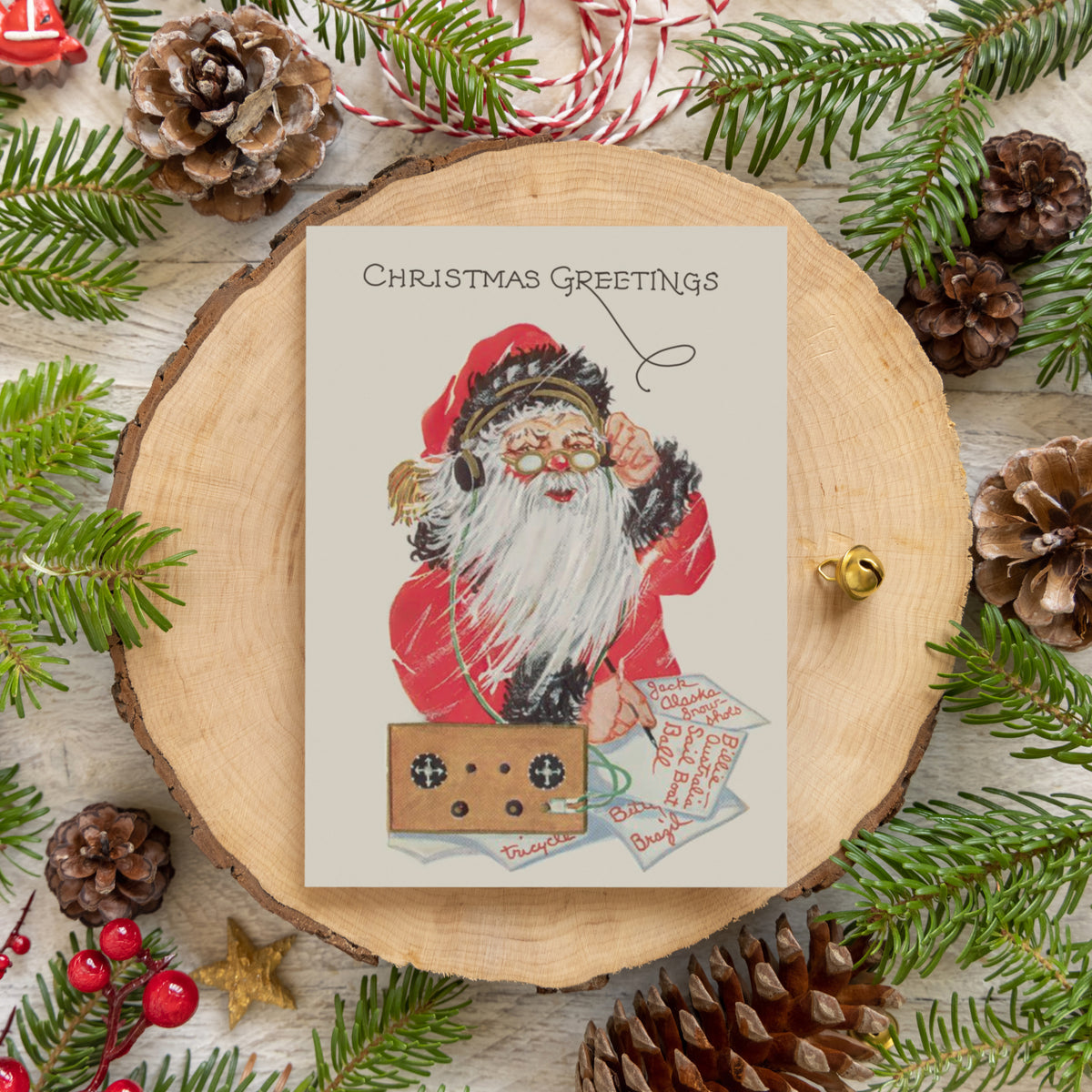 Santa Claus in black-trimmed red coat with headphones and radio receiver, set of 24 Christmas greeting cards.